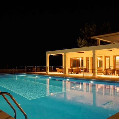 Night photo of the pool